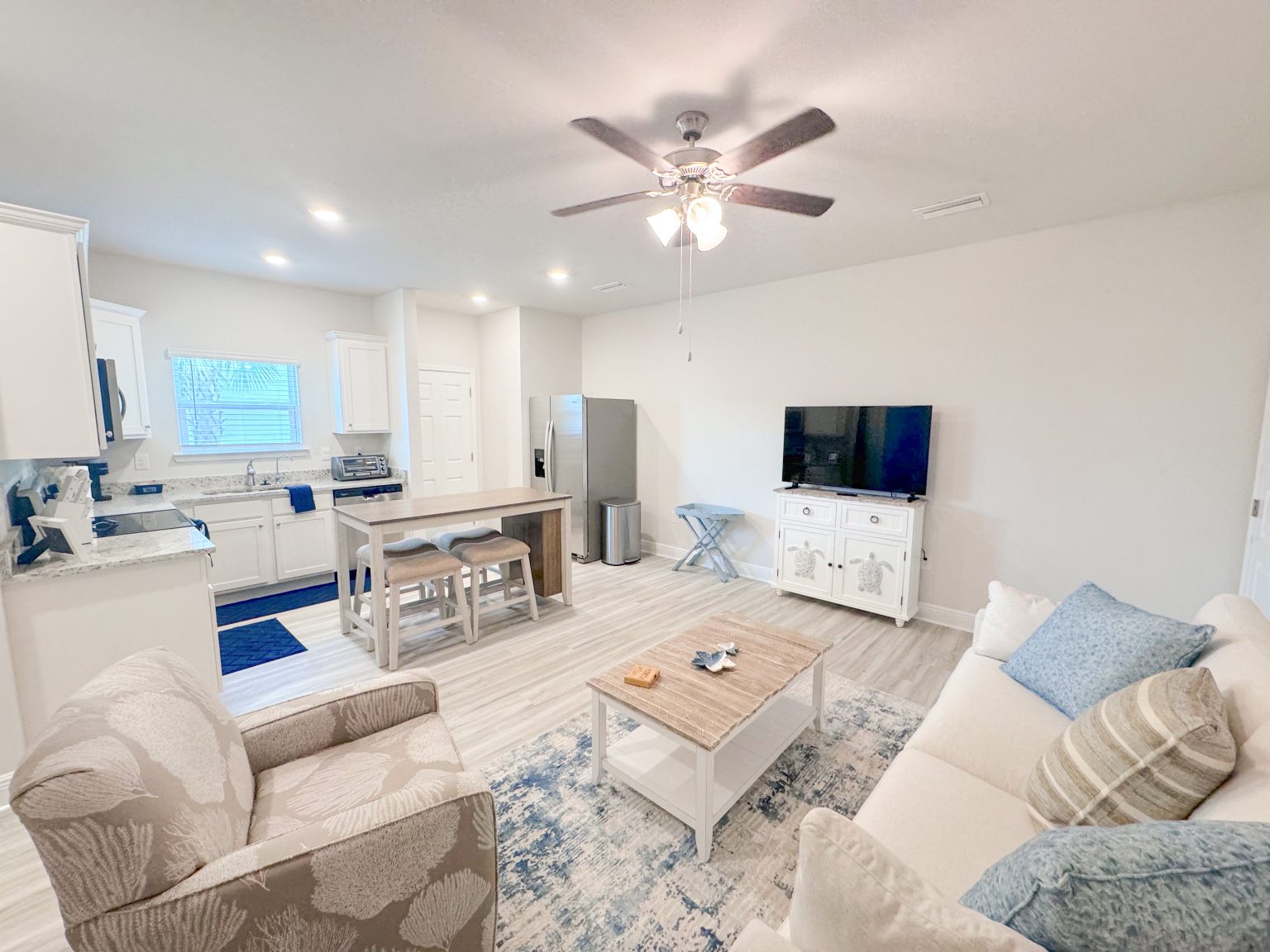 The Suite — open living and kitchen